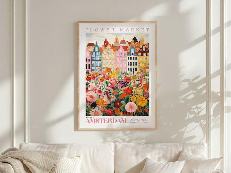 a vibrant poster of the Flower Market in Amsterdam, with colorful buildings and flowers in the foreground.