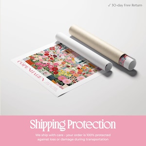 a poster of a colorful floral pattern, along with a roll of paper and a cardboard tube, all placed on a white background.