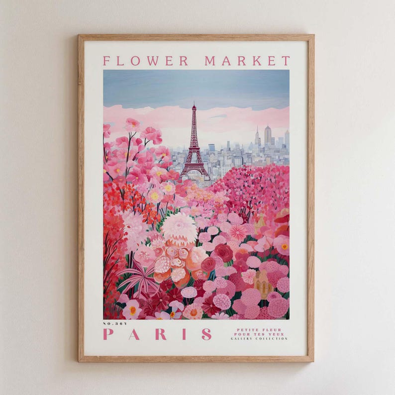 May include: A framed art print titled "Flower Market" featuring a vibrant illustration of the Eiffel Tower in Paris, surrounded by pink and red flowers. The artwork has the word "Paris" at the bottom.