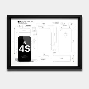 May include: A black-framed wall art piece featuring a technical schematic of an iPhone 4S. The white background displays exploded-view diagrams of internal components, while a physical black iPhone 4S is mounted on the left side of the frame.