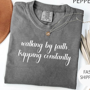 Comfort Colors® Walking By Faith Tripping Constantly Shirt, Christian Bible Verse Graphic Tee, Religious Apparel, Christmas gift Faith Shirt