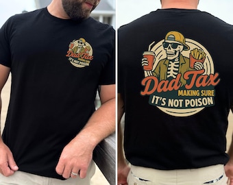 May include: Black t-shirt with a graphic on the front and back. The front graphic is a skeleton with the text "Dad Tax Making Sure It's Not Poison". The back graphic is a skeleton wearing sunglasses and a hat, holding a drink and fries.