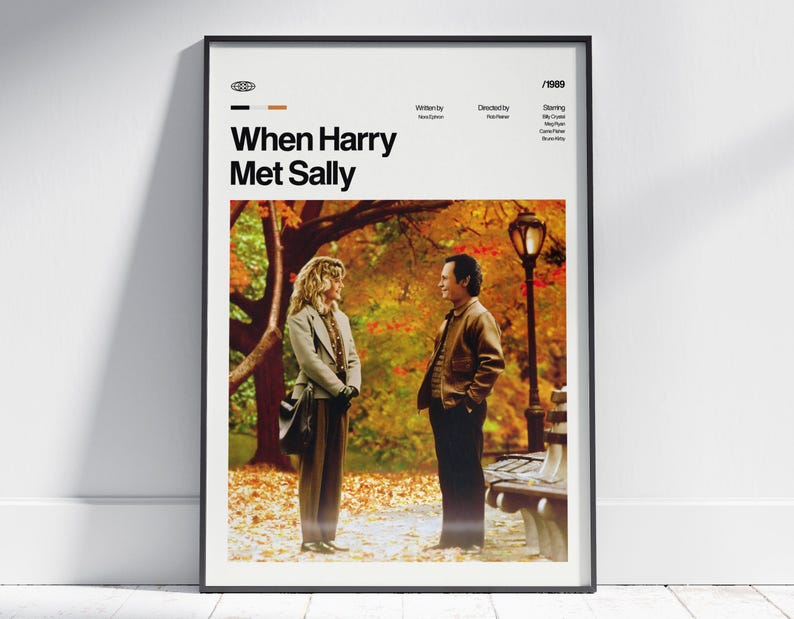 May include: A framed movie poster for "When Harry Met Sally" with a black frame. The poster features a photo of the two main characters in a park setting with fall foliage. The title and credits are at the top.