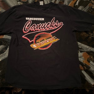 Canucks t shirt vintage top