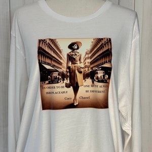 In order to be irreplaceable one must always be different - Coco Chanel; Women&#39;s Lifestyle Graphic Shirt
