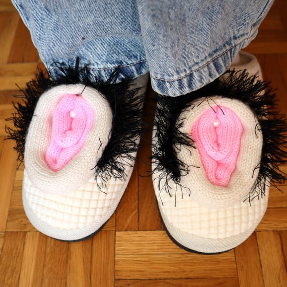 Handmade plush slippers shaped like, well, a vagina — absurdly committed to the bit and genuinely funnier to hand someone than any gag gift card.