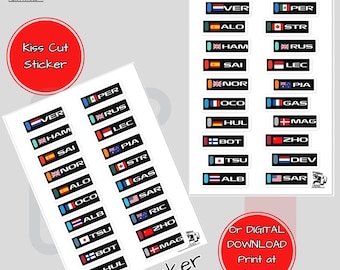 Könnte beinhalten: Zwei Blätter mit Kiss-Cut-Aufklebern mit Flaggen und Fahrernamen aus der Formel 1. Die Aufkleber sind mit "Sticker 1" und "Sticker 2" beschriftet.