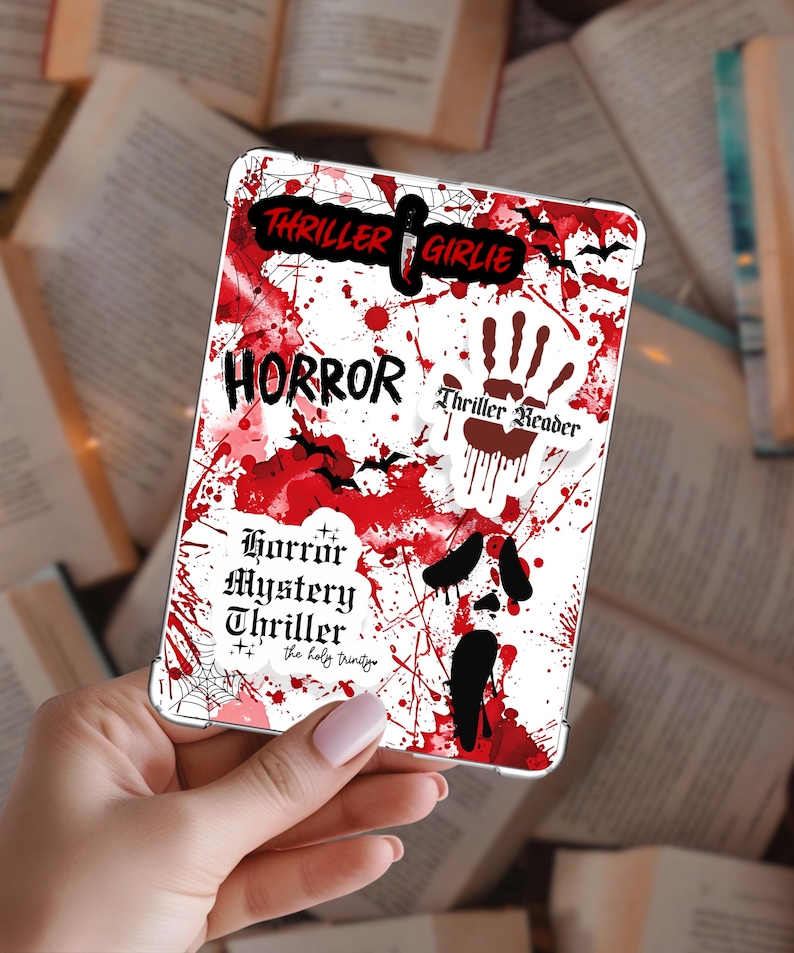 Horror-themed Kindle cardstock insert featuring a creepy red, black, and white bookish design with blood splatters and spooky typography, shown inside a clear Kindle case.