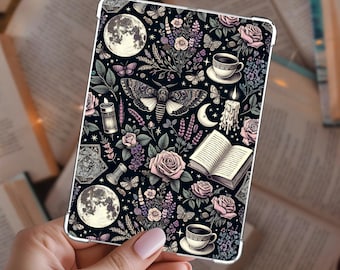 May include: A rectangular tablet case featuring a dark background with a repeating pattern of full moons, moths, pink roses, lavender sprigs, butterflies, lit candles, open books, and cups of coffee, all rendered in a detailed illustrative style.