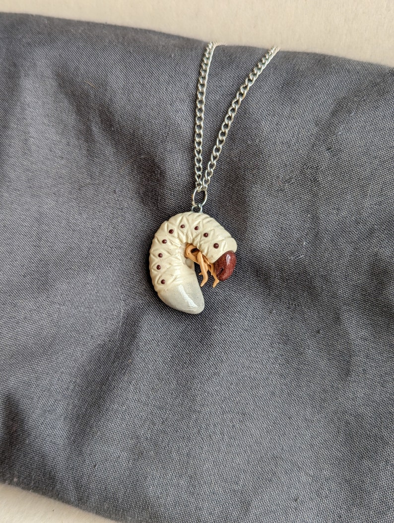 White Grub Pendant Necklace Etsy