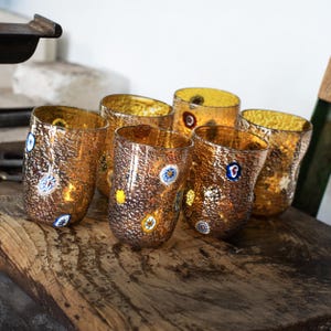 Set of 6 Goti de Fornase glasses in handmade topaz Murano glass, decorated with silver leaf and colored murrine, Venetian Tumblers by Muma