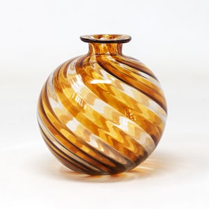 Spherical shaped Murano glass vase decorated with a orange spiral. Made in Italy Muma product