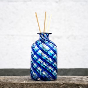 Cylindrical Air freshener / Jar Murano glass vase decorated with filigree blue and light blue spiral. Made in Italy product by Muma.