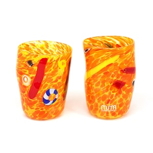 Set of 2 Goti de Fornase glasses handmade in yellow and orange Murano glass, decorated with millefiori murrine, typical Venetian glasses