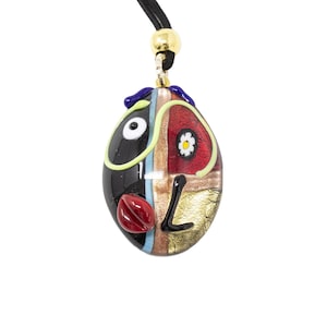 Necklace with oval lampwork pendant in Murano glass with murrine millefiori, decorated with various hot-applied details. Made by Muma