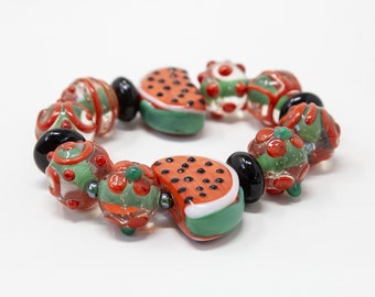 Handmade bracelet with Murano Glass beads with colorful artistic decorations with fruits and flowers, Made in Italy jewelry