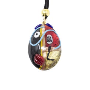 Necklace with oval lampwork pendant in Murano glass with murrine millefiori, decorated with various hot-applied details. Made by Muma