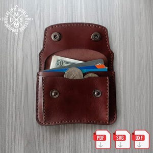 May include: A brown leather wallet, open to reveal cash, coins, and cards. The wallet has a snap closure and is stitched with a lighter brown thread. The image includes the text "CUSTOM WORLD DMS 1990 ALMENDRA BONSAI".