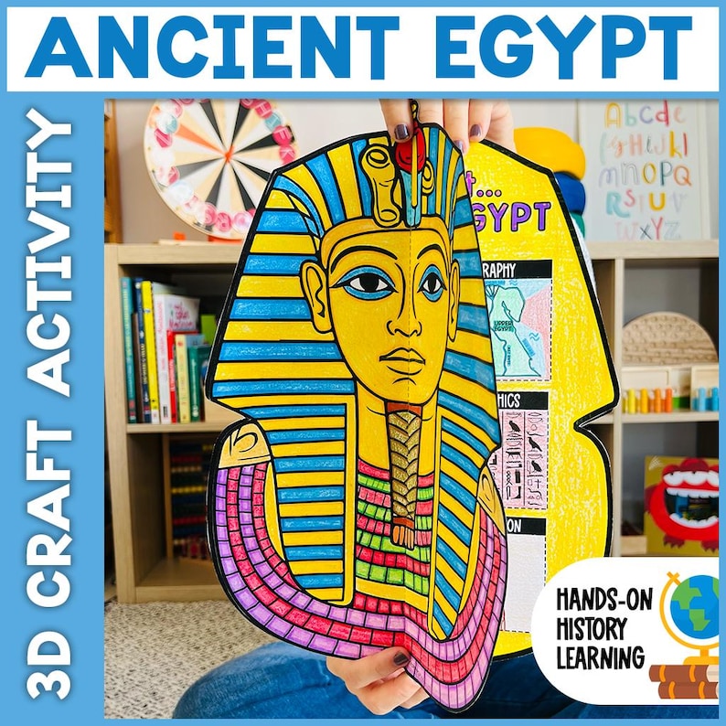 May include: A colorful 3D craft activity featuring the bust of an Ancient Egyptian pharaoh. The craft has a yellow background with blue and yellow stripes, and the text "ANCIENT EGYPT" and "3D CRAFT ACTIVITY". The craft is designed for hands-on history learning.