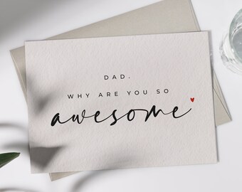 May include: A white card with the text "DAD. WHY ARE YOU SO awesome" in black script with a small red heart. The card is signed "fili" in black script.