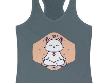 May include: A dark blue tank top with a white cat meditating in a peach-colored hexagon. The cat has a pink nose and a yellow necklace. The hexagon is surrounded by white stars.