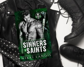Signiertes Taschenbuch von Sinners & Saints