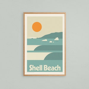 May include: A minimalist poster with a graphic design of a beach scene. The poster features a large orange sun, a green hill, and blue waves. The text "Shell Beach" is printed in white at the bottom of the poster.