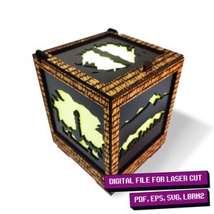 May include: A wooden box with a laser-cut design of a mountain range and a tree. The box is lit from inside, creating a glowing effect. The text "DIGITAL FILE FOR LASER CUT" and "PDF, EPS, SVG, LBRN2" is printed on the bottom of the image.