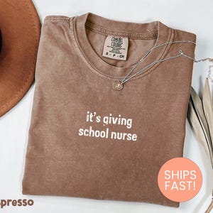 Comfort Colors® It&#39;s Giving School Nurse Shirt, New School Nurse Gifts, Gift for School Nurse, RN Nurse Gifts, First Day of Schoo Shirt