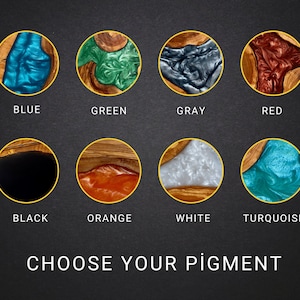 May include: An image displays eight circular wooden pieces with colorful resin pigments: blue, green, gray, red, black, orange, white, and turquoise. The text "CHOOSE YOUR PIGMENT" is at the bottom, inviting customization.