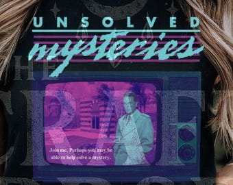 Unsolved Mysteries Graphic Tee – Conspiracy Theory T-Shirt