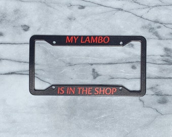 My Lambo Is In the Shop - Funny License Plate Frame Witty License Plate Accessory Aluminum License Plate Cover - Black/Red