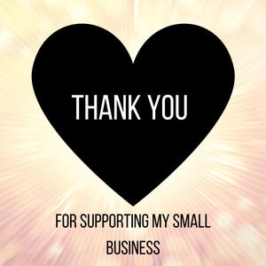 May include: A black heart shape with the words "THANK YOU" in white text. Below the heart, the text reads "FOR SUPPORTING MY SMALL BUSINESS" in a white font against a soft, light-colored background.