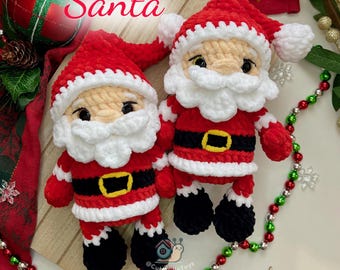 May include: Two handmade crochet Santa Claus dolls. Each doll wears a red suit with a black belt and a white beard and hat. The text "PDF PATTERN Santa" is at the top. The dolls are surrounded by Christmas decorations.