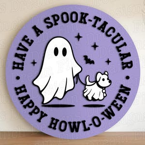 May include: A circular lavender sign featuring a white ghost walking a white dog in a ghost costume. The black text reads HAVE A SPOOK-TACULAR HAPPY HOWL-O-WEEN. Small black stars and a bat silhouette are included in the design on the lavender background.