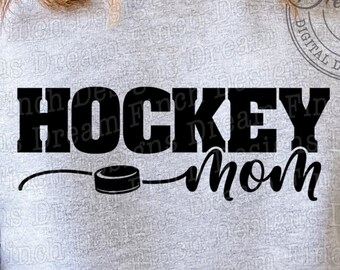 May include: A grey sweatshirt with the text "HOCKEY MOM" in black lettering. A black hockey puck is drawn below the text.