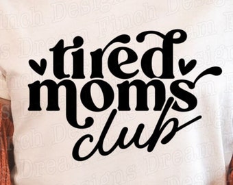 May include: Cream-colored t-shirt with the words "tired moms club" in a black, bold, retro font. The design includes small heart accents. The shirt is part of a digital download collection, as indicated by the text at the bottom.