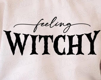 May include: A white sweatshirt with the words "feeling WITCHY" in black script and bold letters. The sweatshirt is a digital download, as indicated by the text at the bottom of the image. The design is suitable for Halloween or witch-themed crafts.