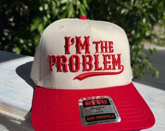 I'm The Problem Trucker Hat: Red & Cream Embroidered Snapback