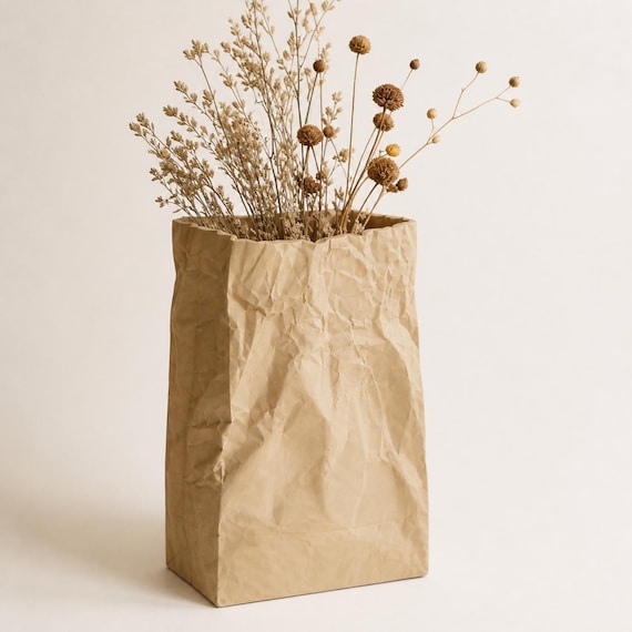 Close-up of the Medium PaperMuse sculptural container with dried botanicals