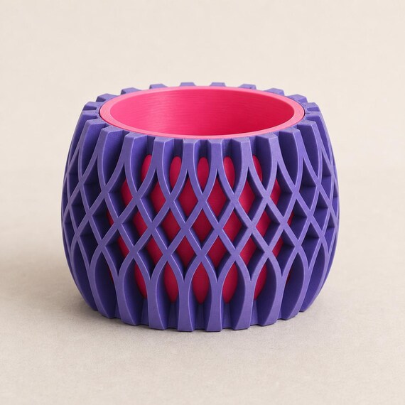 Close-up of the LatticeBloom planter in Indigo Purple and Hot Pink