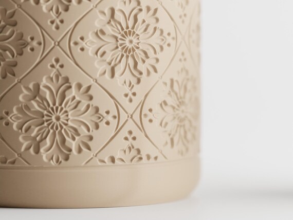 Close-up of the Petalweave Petal Lattice planter's dimensional botanical texture