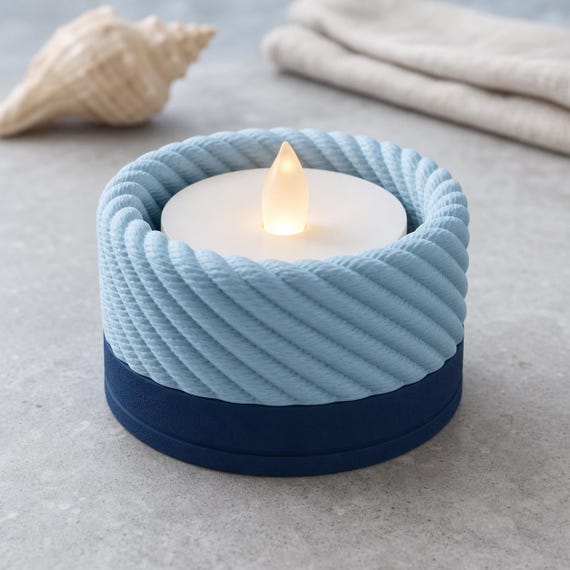 Harbor Weave LED tealight holder in the Dark Blue and Ice Blue Coastal Mist colorway