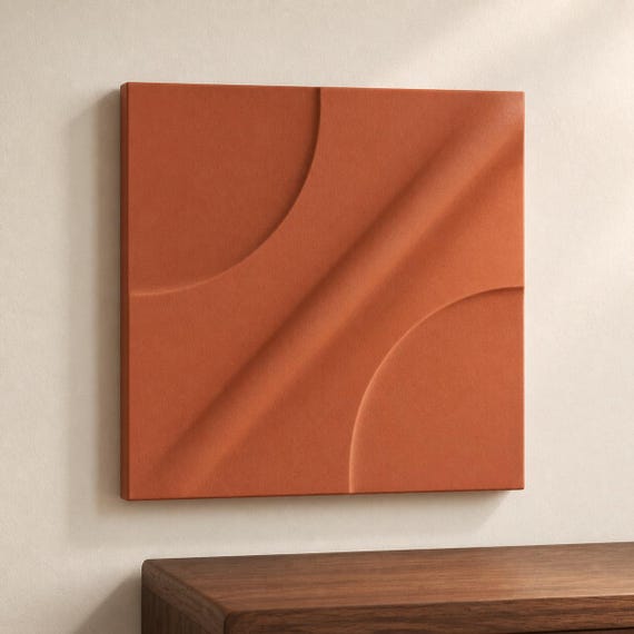 Close-up Terracotta OrbitArc geometric wall tile above a walnut console