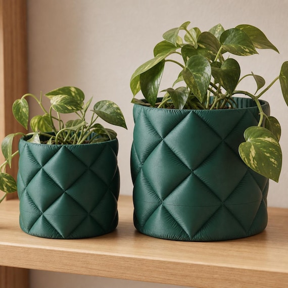 Close-up comparison of medium and large freestanding QuiltHaven quilted planters