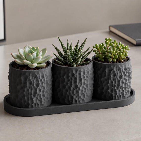 Close-up Charcoal Tessellune mini planter trio styled on a desk
