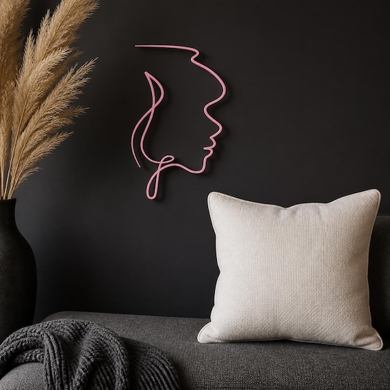 Motherhood Profile wall art in Pink in a contrasting showcase room