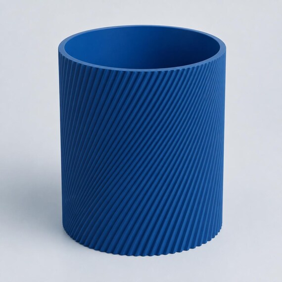 Rear three-quarter close-up of an empty Marine Blue SlantThread ribbed planter