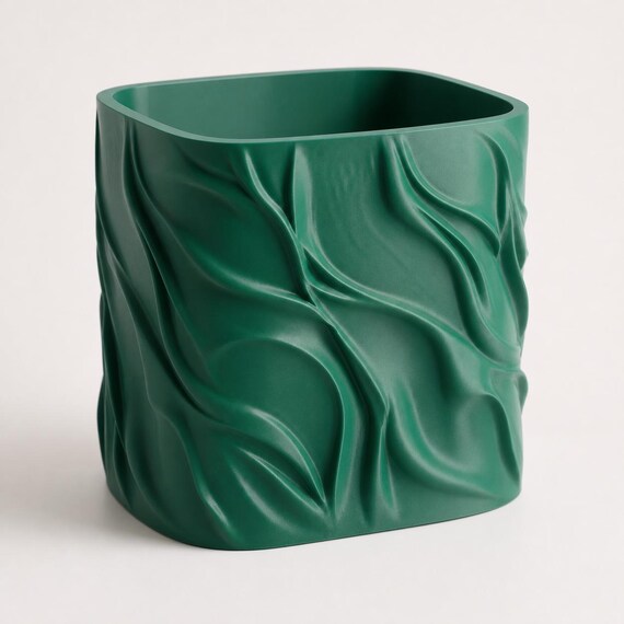 Rear three-quarter view of an empty Mistletoe Green BreezeFold textured planter