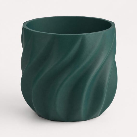 Empty Mistletoe Green CurrentFold planter showing its circular opening and curved ribs